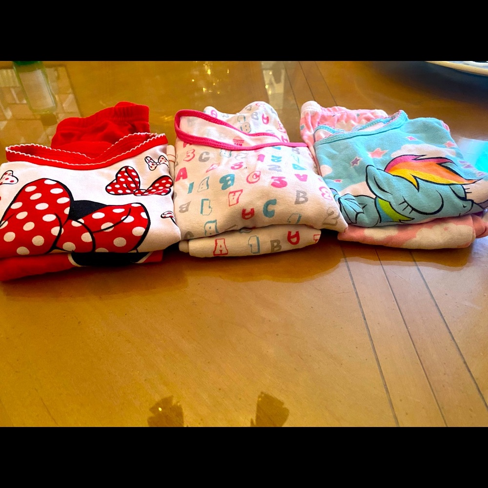 Three sets of long sleeve baby girls Pajama sets.